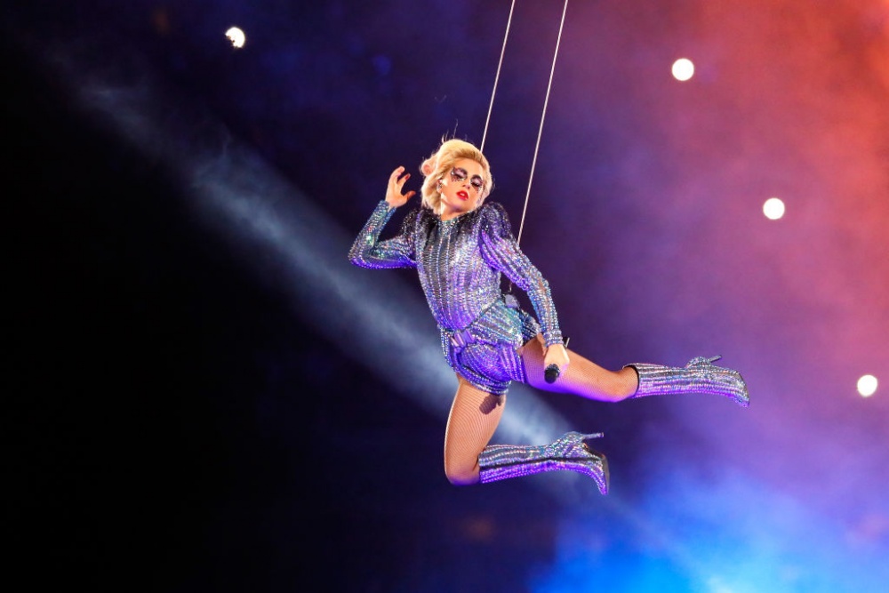 Lady Gaga wearing a silver Versace jumpsuit at the Superbowl half-time show